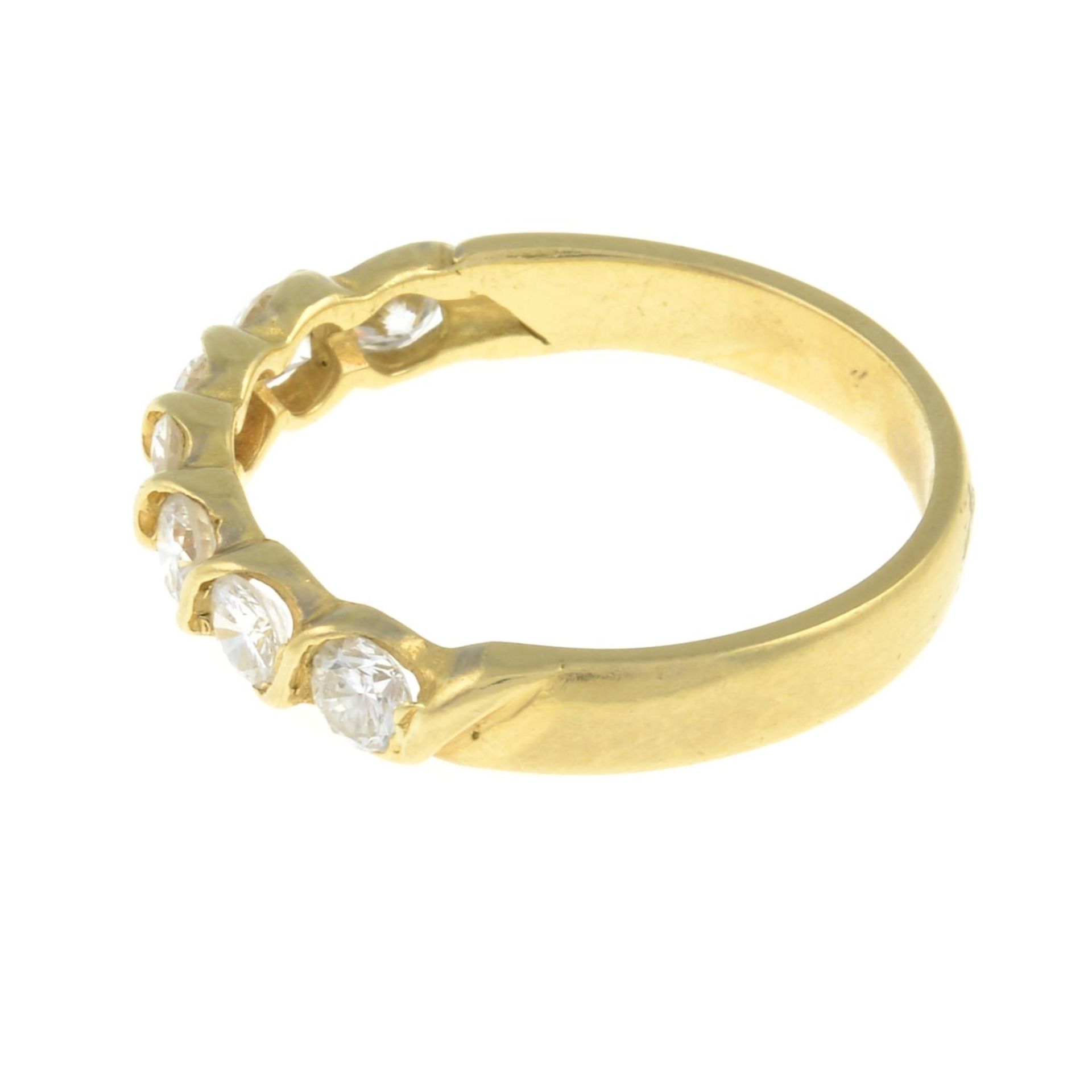 An 18ct gold brilliant-cut diamond seven-stone ring.Estimated total diamond weight 0.75ct, - Image 2 of 3