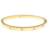 A brilliant-cut diamond bangle,