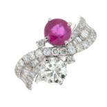 A vari-cut diamond and ruby crossover ring.Ruby is glass-filed.