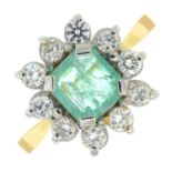 An emerald and brilliant-cut diamond cluster ring.Emerald calculated weight 0.66ct,