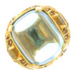 A topaz cabochon and citrine dress ring.Estimated dimensions of topaz 17 by 14 by 16mms.Stamped