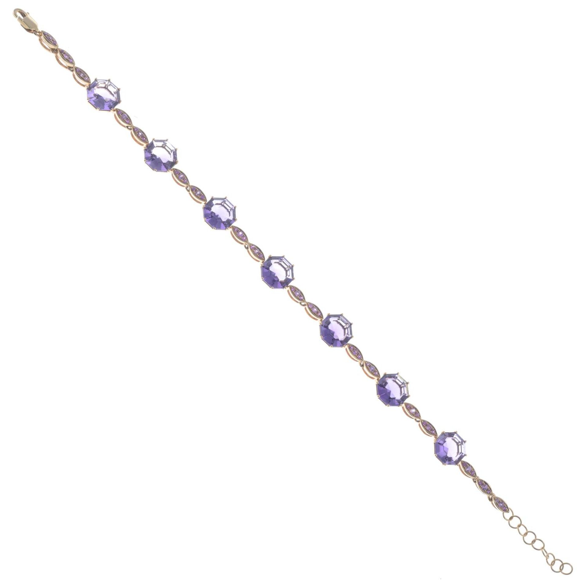 An 18ct gold amethyst and pink sapphire bracelet.Total amethyst weight 13.68cts, - Image 2 of 3