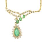 An emerald and vari-cut diamond necklace.Principal pear-shape emerald calculated weight 0.91ct,