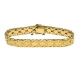 An 18ct gold fancy bracelet.Hallmarks for Edinburgh.Length 17.5cms.