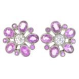 A pair of pink sapphire and brilliant-cut diamond floral earrings.Estimated total diamond weight