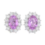 A pair of 18ct gold pink sapphire and brilliant-cut diamond cluster earrings.