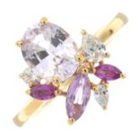 An 18ct gold pink sapphire and vari-cut diamond ring.Estimated total diamond weight 0.15ct,