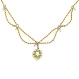 An early 20th century gold peridot and split pearl cluster pendant,