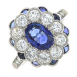 A sapphire and brilliant-cut diamond dress ring.Principal sapphire calculated weight 11.49cts,