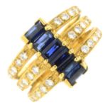 An 18ct gold sapphire and brilliant-cut diamond dress ring.Estimated total diamond weight