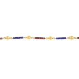 An early 20th century gold enamel bracelet.