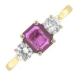 An 18ct gold ruby and brilliant-cut diamond three-stone ring.Ruby calculated weight 0.91ct,