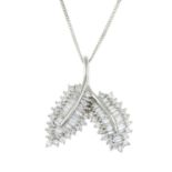 An 18ct baguette and brilliant-cut diamond foliate pendant,