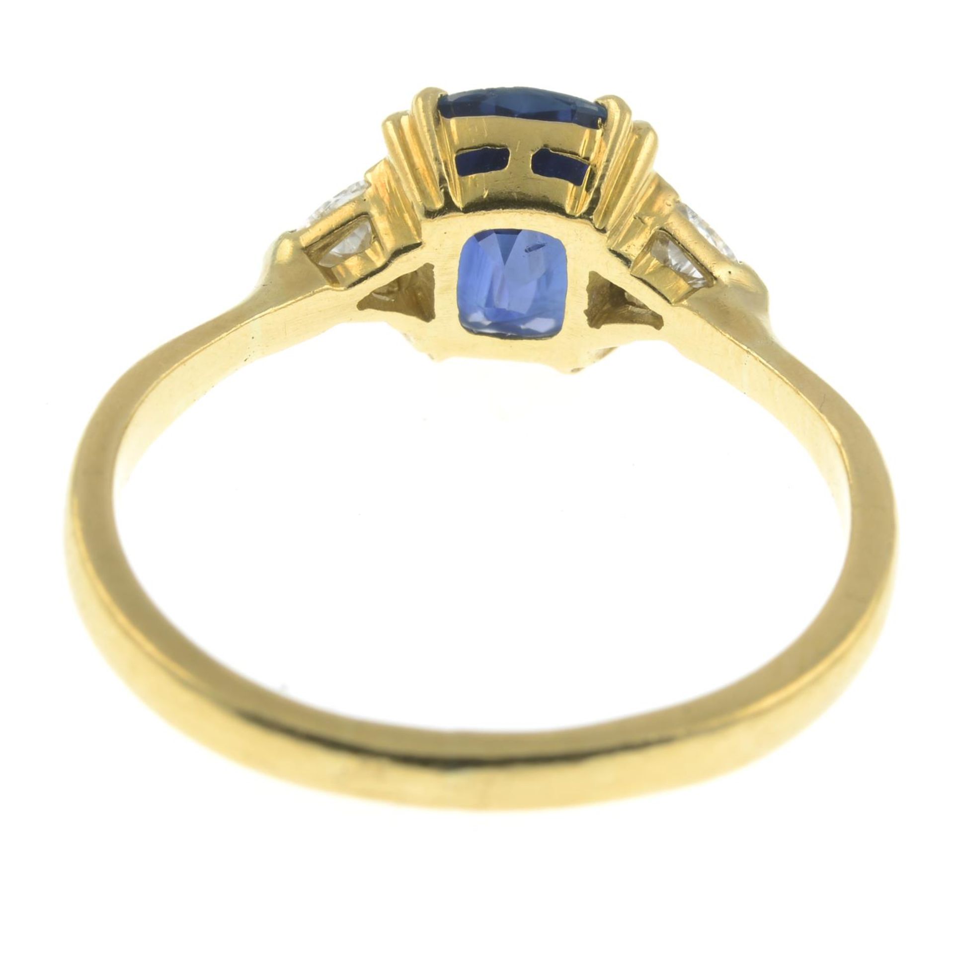 An 18ct gold sapphire and triangular-shape diamond three-stone ring.Sapphire calculated weight - Image 3 of 3