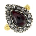 A garnet cabochon and rose-cut diamond cluster ring.Ring size M.