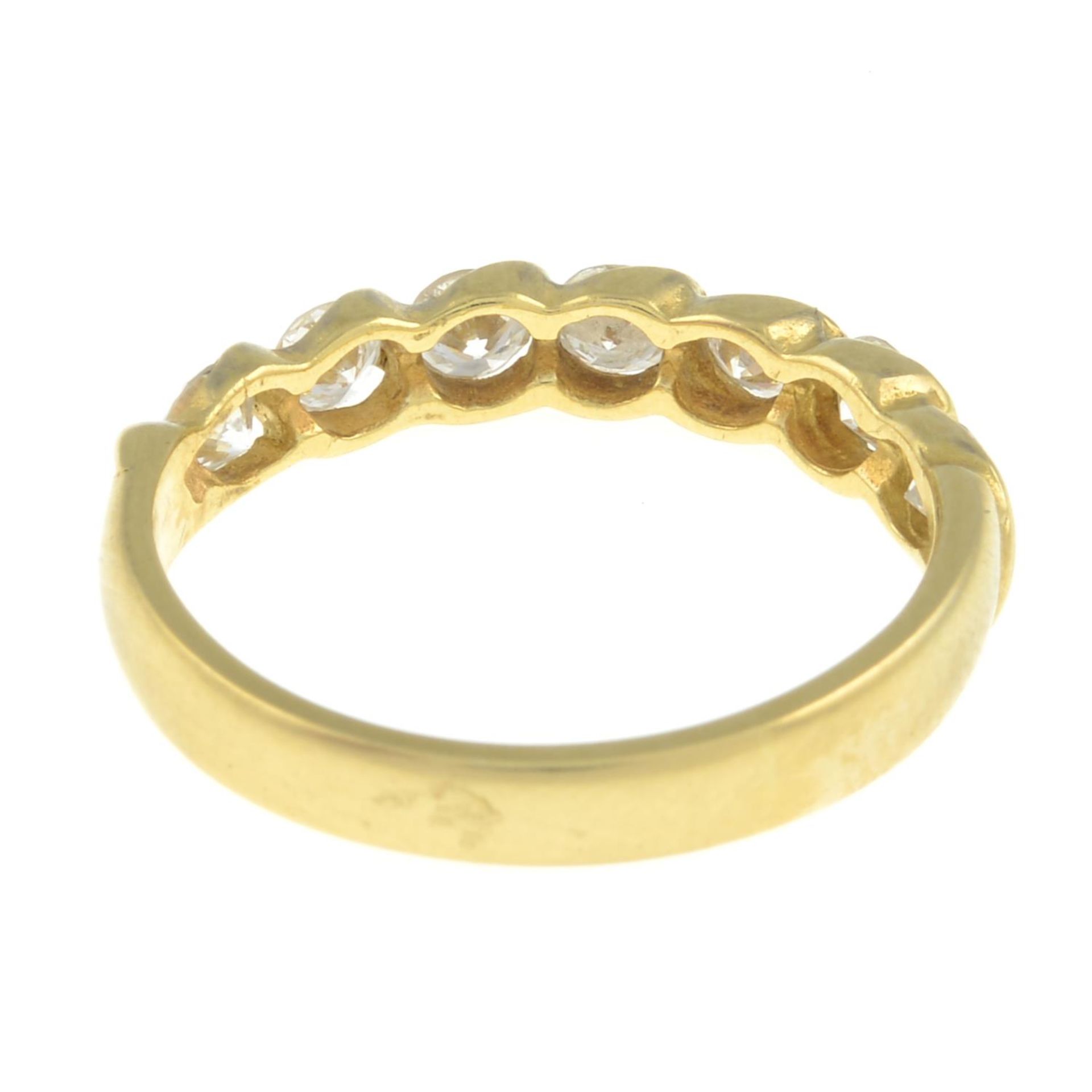 An 18ct gold brilliant-cut diamond seven-stone ring.Estimated total diamond weight 0.75ct, - Image 3 of 3