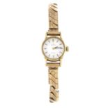 OMEGA - a lady's Genève bracelet watch.