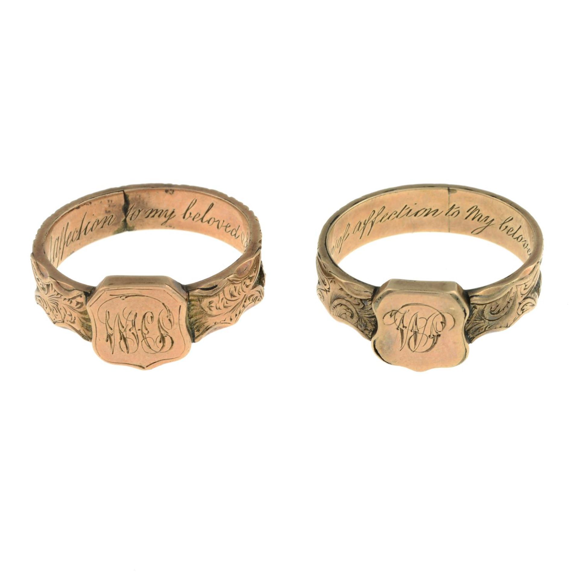 A pair of mid Victorian gold mourning rings, each with hairwork band.