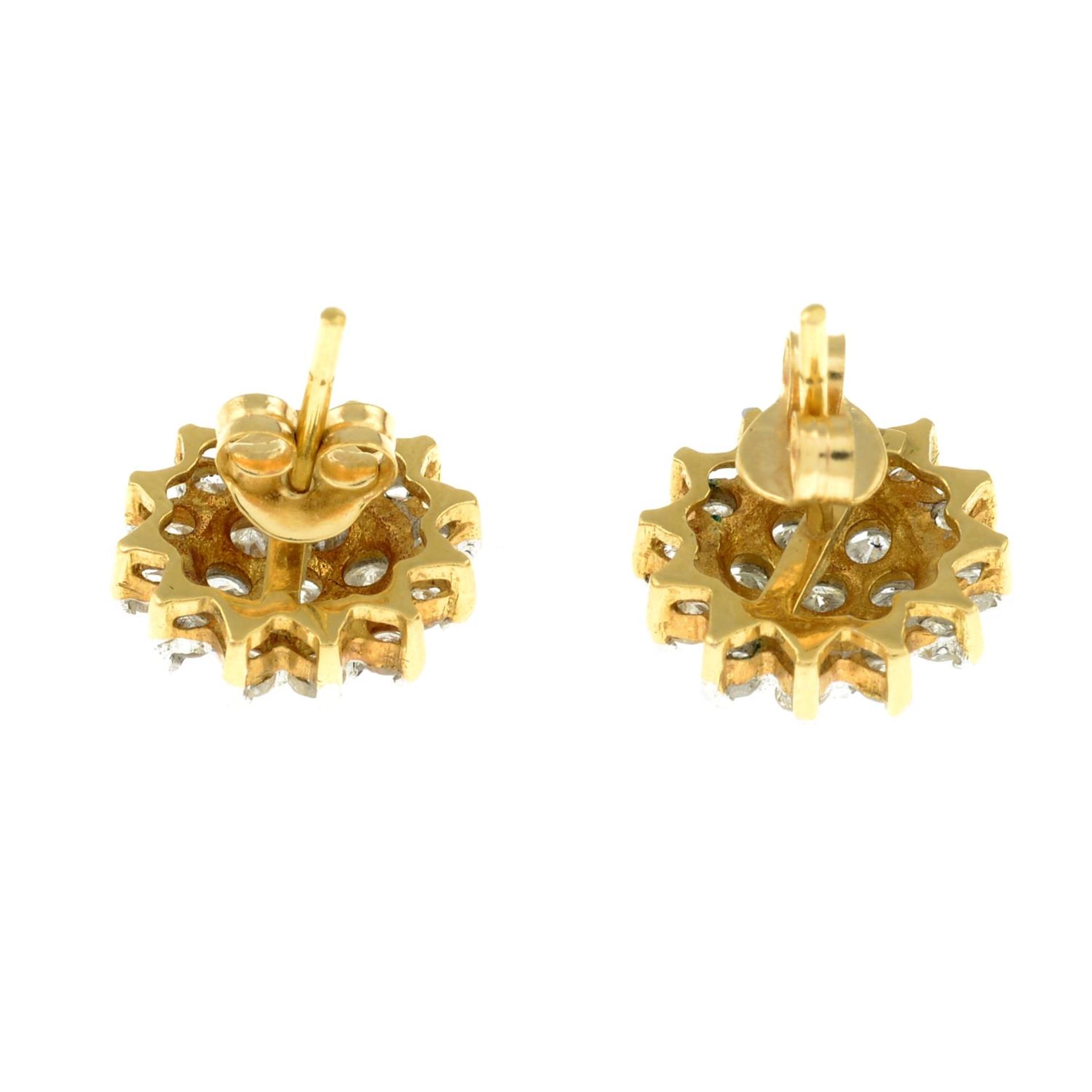 A pair of diamond cluster earrings.Estimated total diamond weight 1ct. - Image 2 of 2