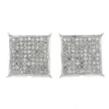 A pair of diamond earrings.Total diamond weight 0.50ct, stamped to mount.