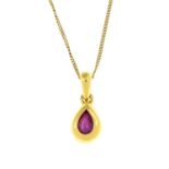 An 18ct gold ruby pendant, with 18ct gold chain.Hallmarks for 18ct gold.