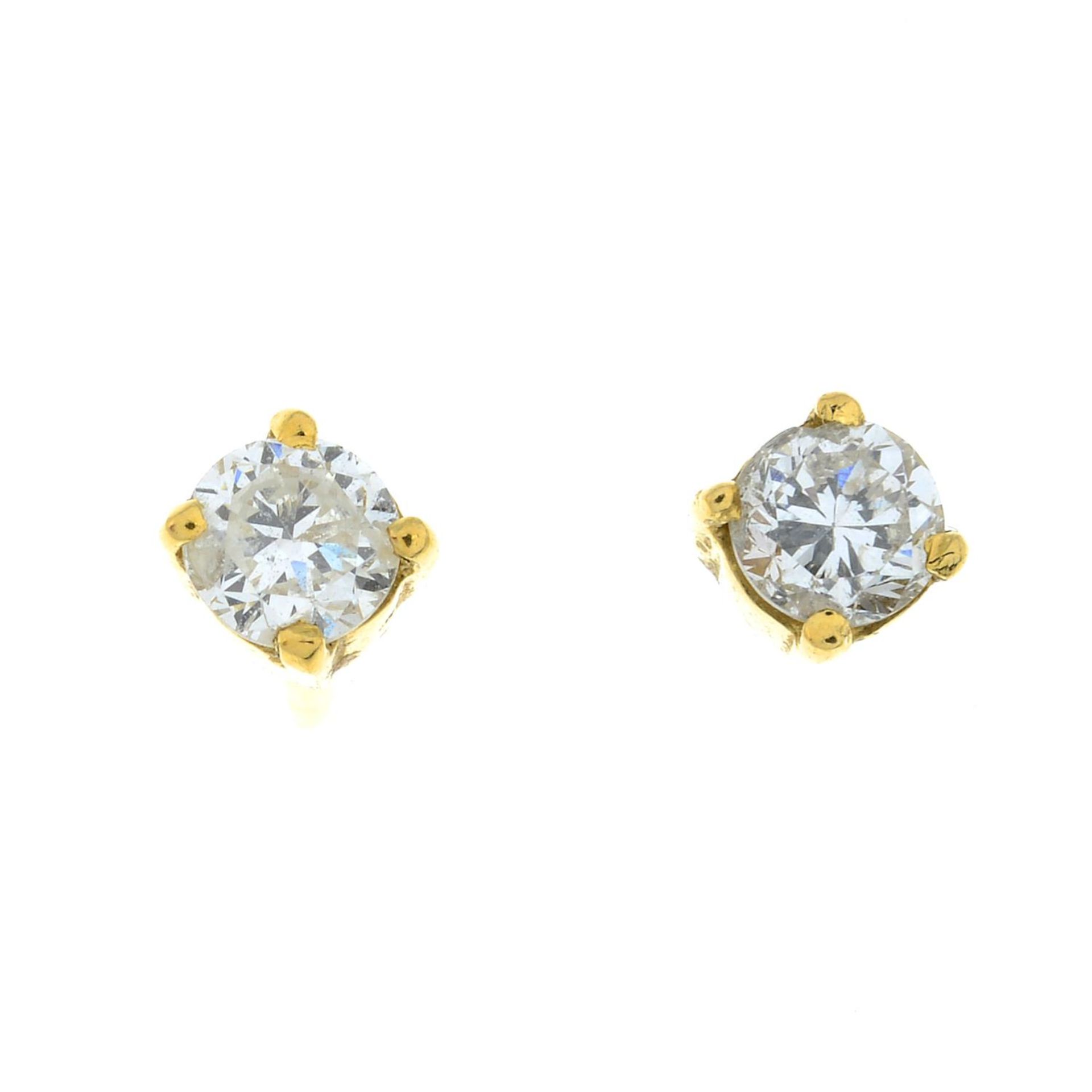 A pair of diamond stud earrings.Estimated total diamond weight 0.30ct, I-J colour, SI2-P1 clarity.