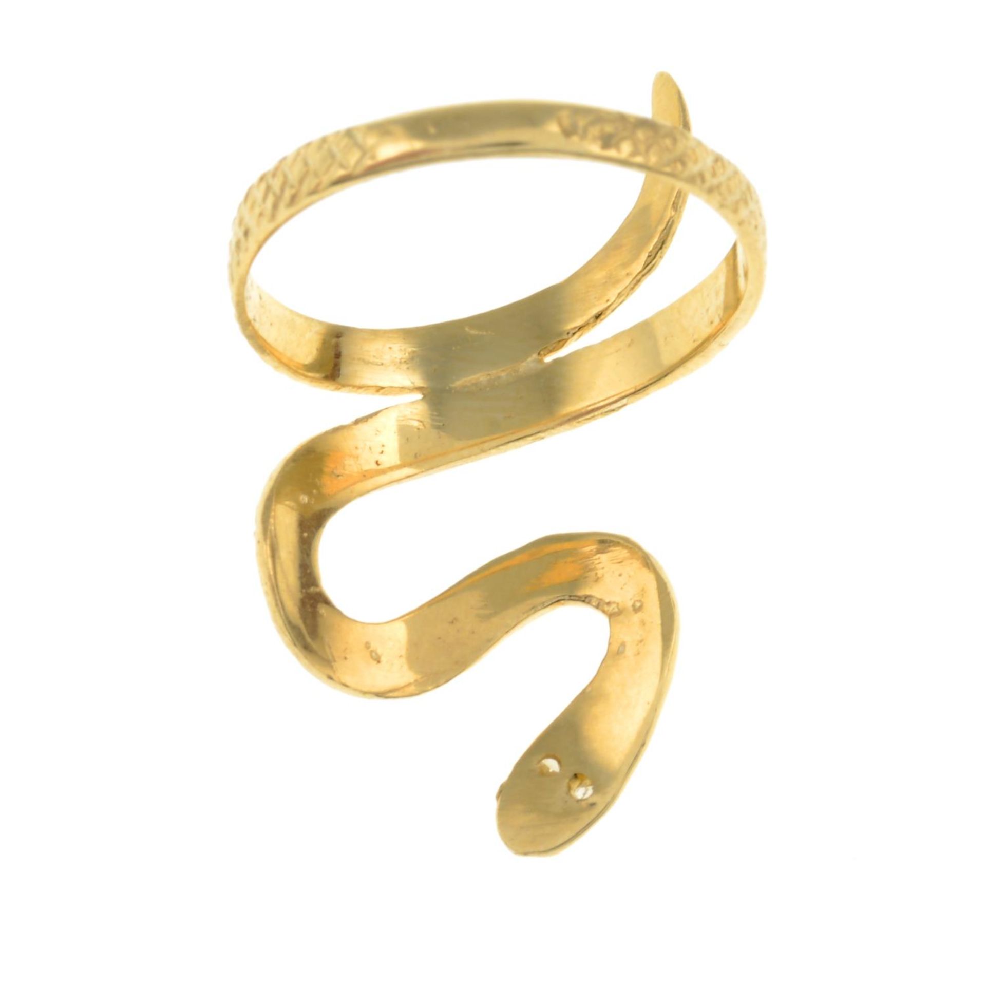 A textured snake ring, with diamond eyes. - Image 2 of 2