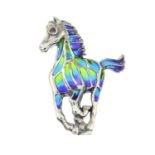 A ruby and plique-a-jour enamel brooch, designed to depict a galloping horse.Length 3.8cms.