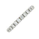 A diamond half eternity ring.Estimated total diamond weight 0.60ct.Band stamped 14K.