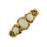 A 9ct gold opal three-stone ring.Hallmarks for 9ct gold, partially indistinct.