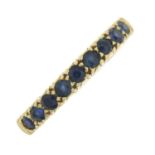 An 18ct gold sapphire half eternity ring.Hallmarks for 18ct gold.