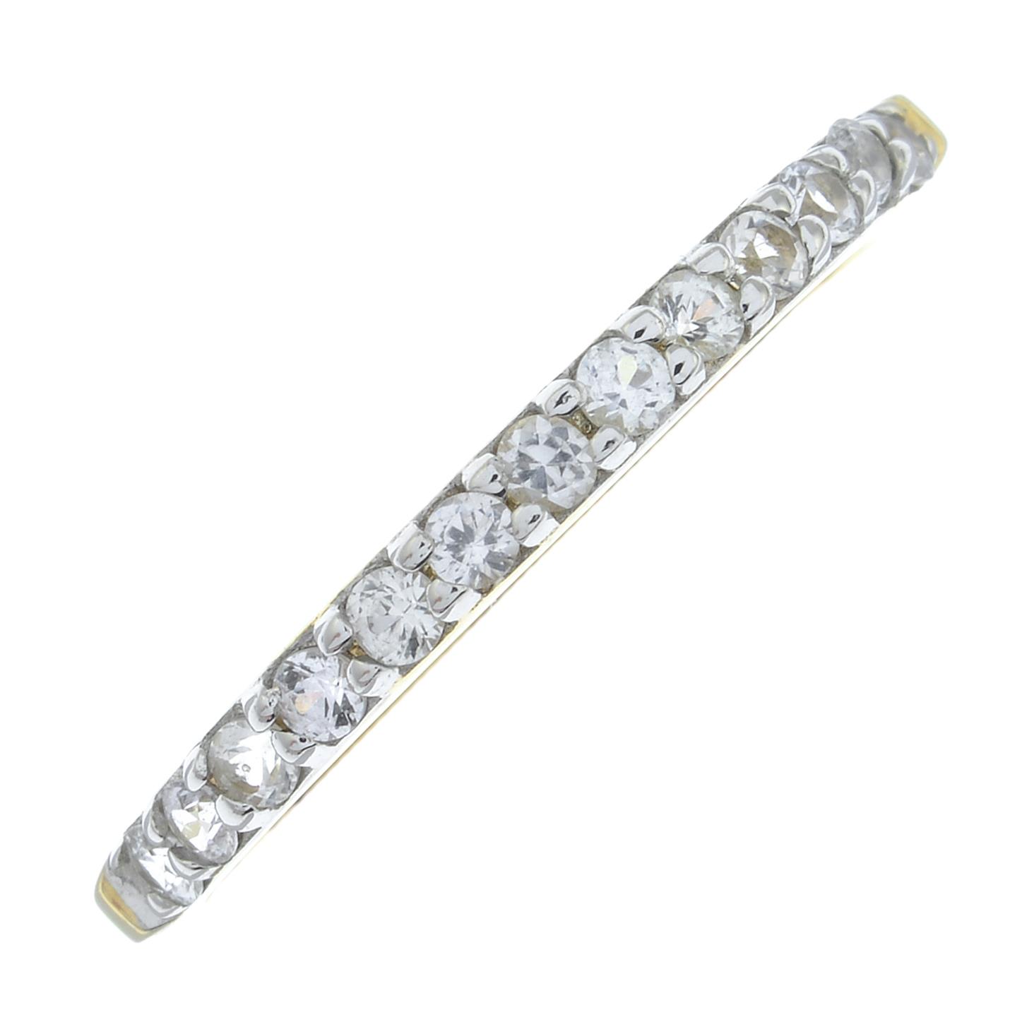 Seven 9ct gold white sapphire and colourless zircon half eternity rings.Hallmarks for 9ct gold.