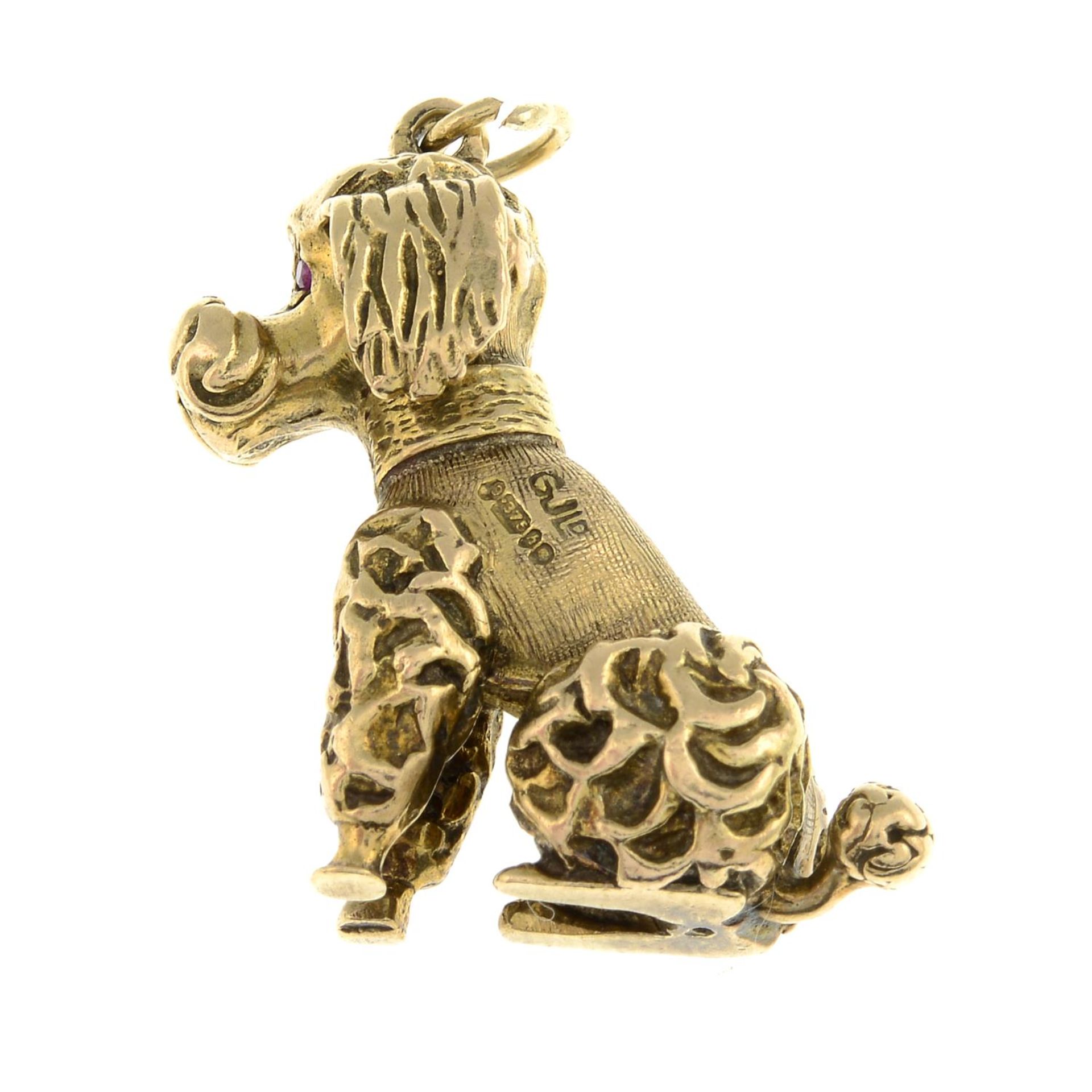 A 9ct gold poodle dog pendant, with synthetic ruby eye highlights.Hallmarks for 9ct gold. - Image 2 of 2