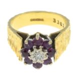 An 18ct gold ruby and diamond cluster ring.Hallmarks for 18ct gold.