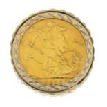 A 9ct gold full sovereign ring.Sovereign dated 1911.