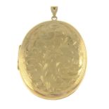 A 9ct gold engraved foliate locket.Hallmarks for 9ct gold.