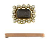 Late 19th century split pearl memorial brooch, length 2.5cms, 5.7gms.