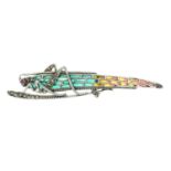 A ruby, pyrite and plique-a-jour enamel brooch, designed to depict a grasshopper.Stamped 925.