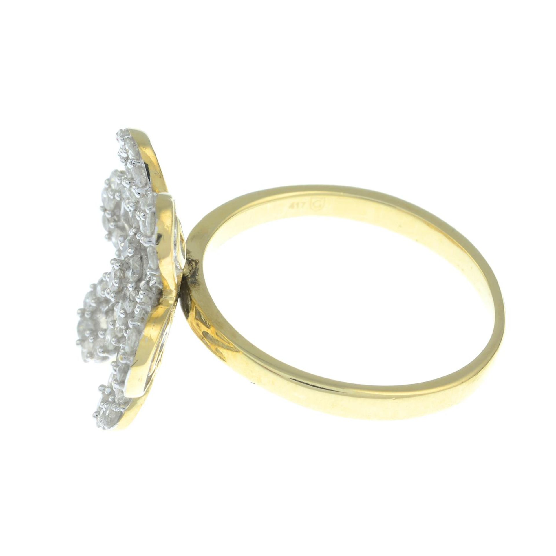 A 9ct gold diamond floral dress ring.Estimated total diamond weight 0.75ct. - Image 3 of 3