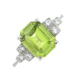 A peridot and brilliant-cut diamond dress ring.Estimated total diamond weight 0.15ct.Stamped