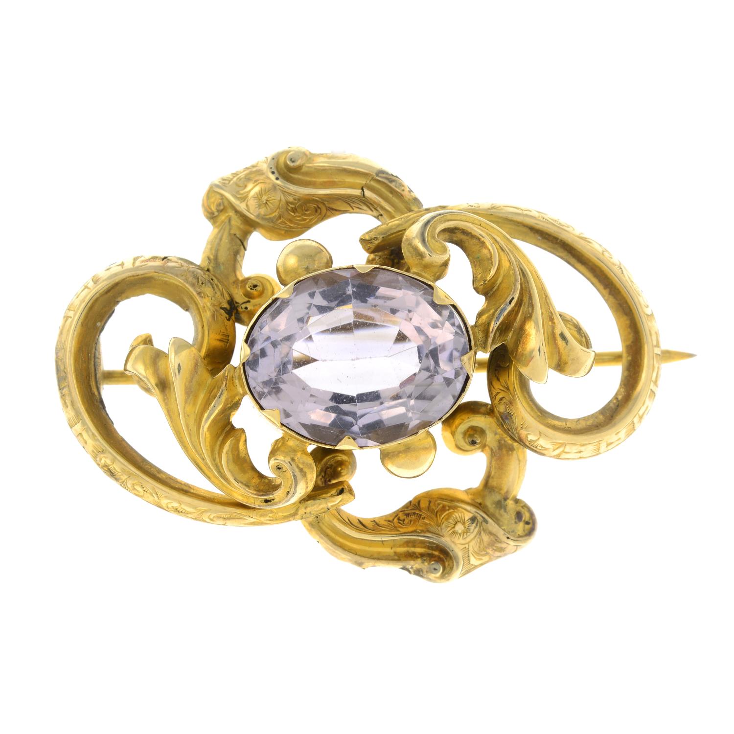 A mid Victorian gold amethyst brooch.Length 5cms.