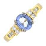 A diamond and sapphire ring.Estimated total diamond weight 0.15ct.