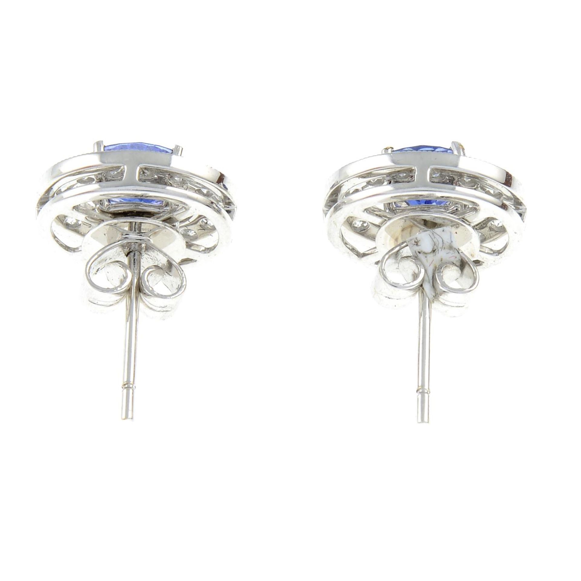 A pair of sapphire stud earrings with removable diamond hoop surround.Total diamond weight 0.49ct, - Image 2 of 2