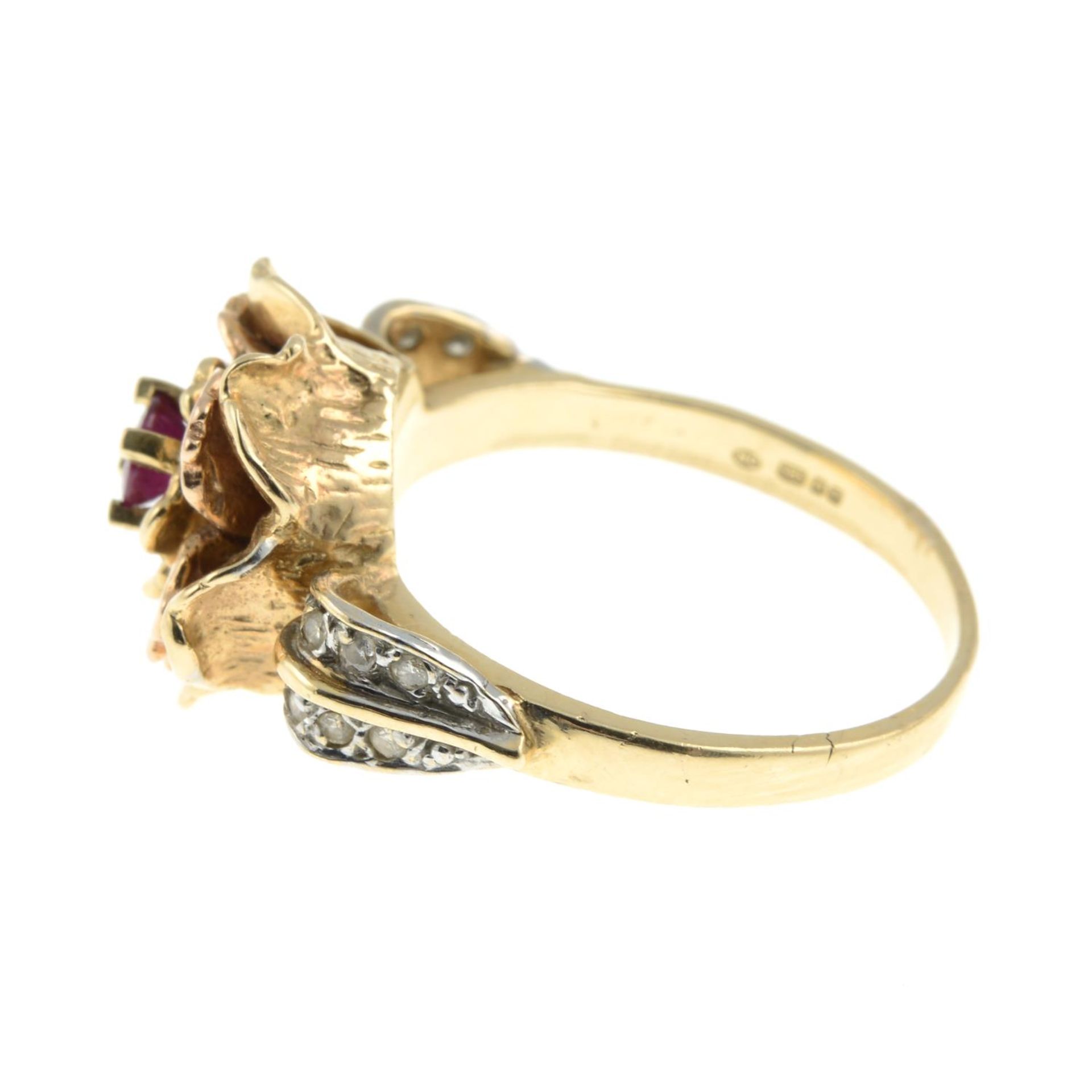 A 14ct gold ruby and diamond flower ring.Import marks for Birmingham.Ring size Q. - Image 2 of 3