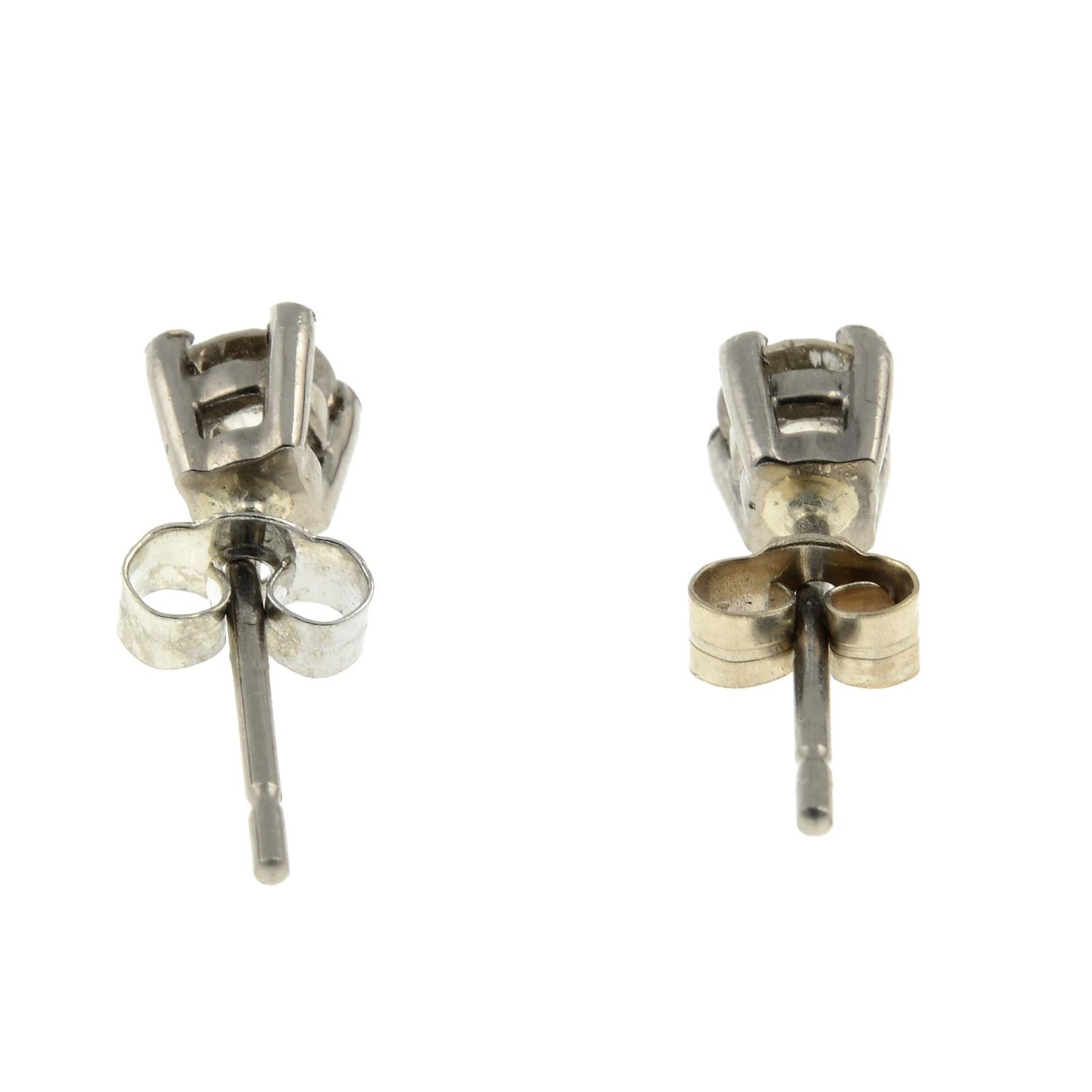 A pair of 18ct gold diamond stud earrings.Estimated total diamond weight 0.40ct, - Image 2 of 2