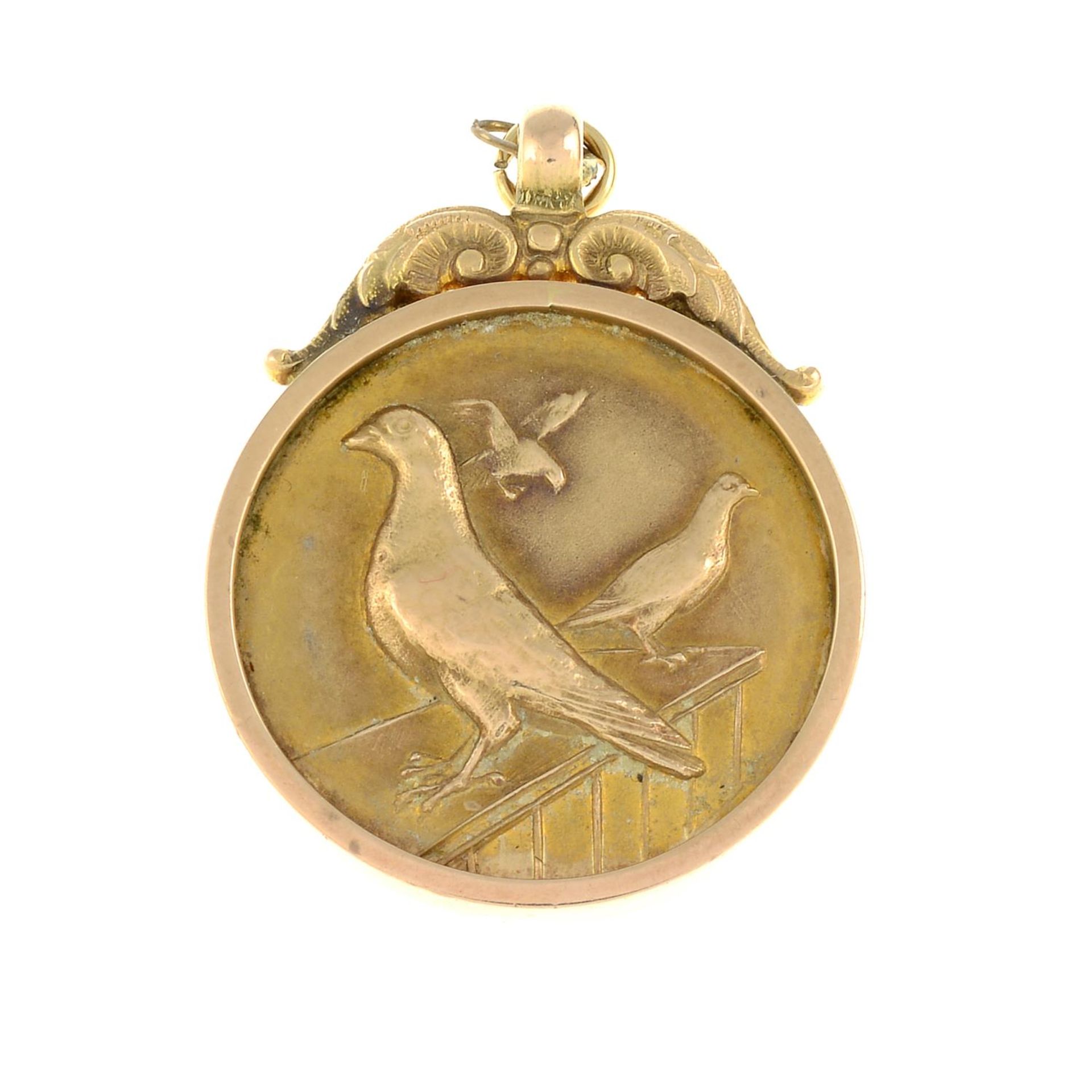 An early 20th century 9ct gold medallion.Hallmarks for Birmingham, 1932.Length 3.4cms.