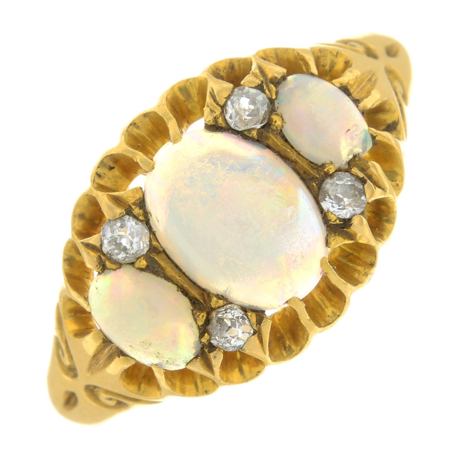 An Edwardian 18ct gold opal and diamond ring.Hallmarks for Birmingham, 1904.