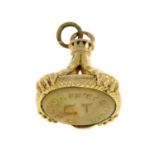 An early 20th century gold gem-set seal fob,
