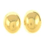 A pair of polished stud earrings.Stamped 750.