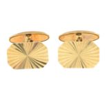 A pair of 9ct gold cufflinks.Hallmarks for 9ct gold.